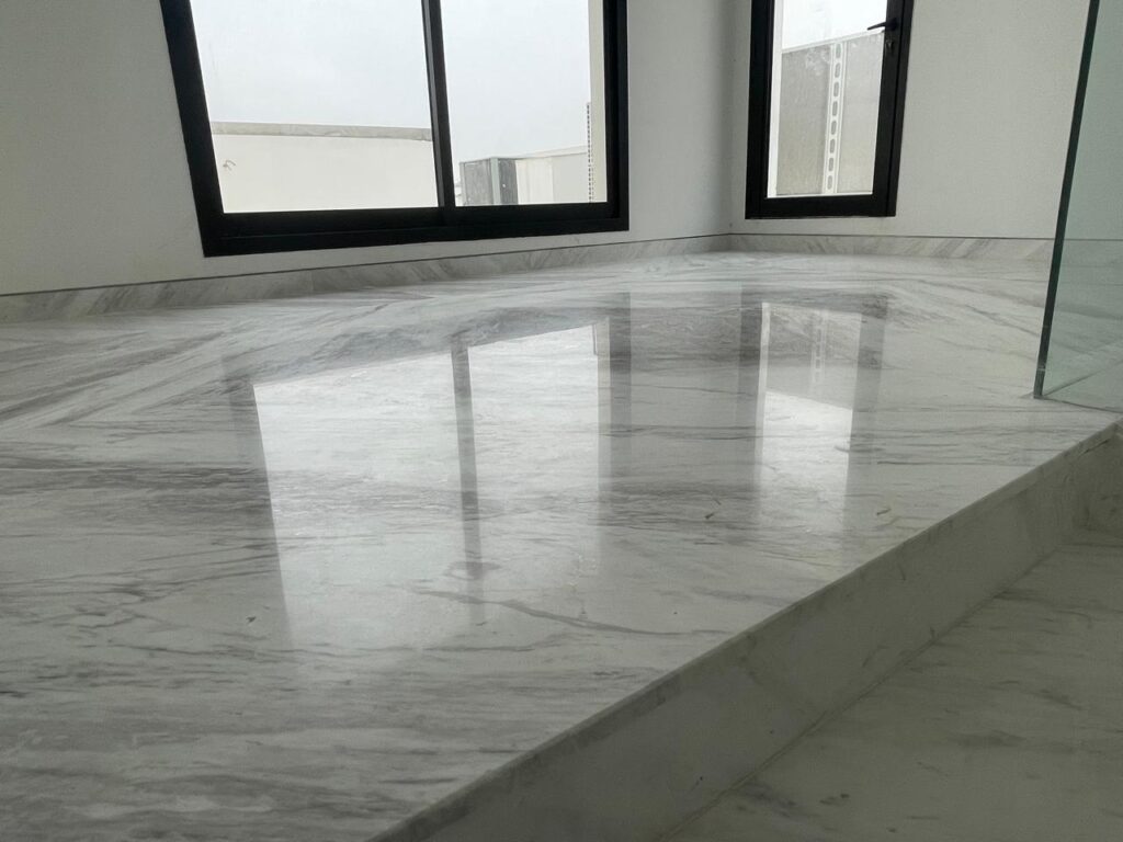 Restored marble floor shining after professional polishing in Al Khawaneej villa. we give tips for How to Maintain Marble Floor in Dubai
