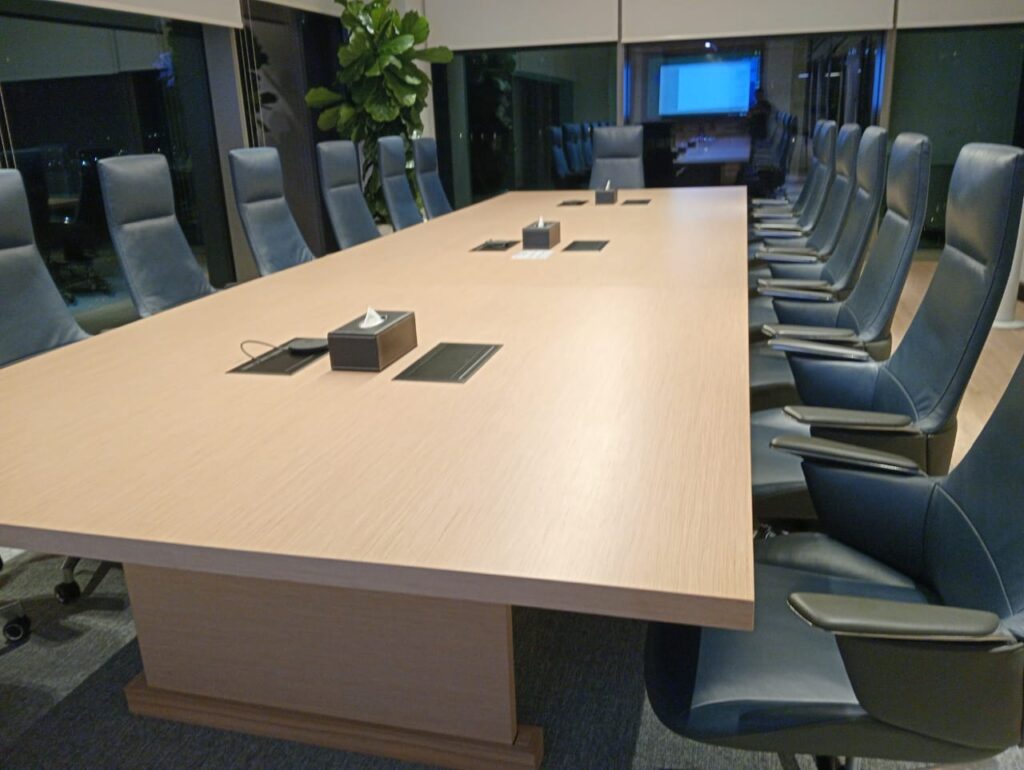 Professional cleaning of a corporate meeting room with spotless tables and chairs. alcazar energy, Dubai hills