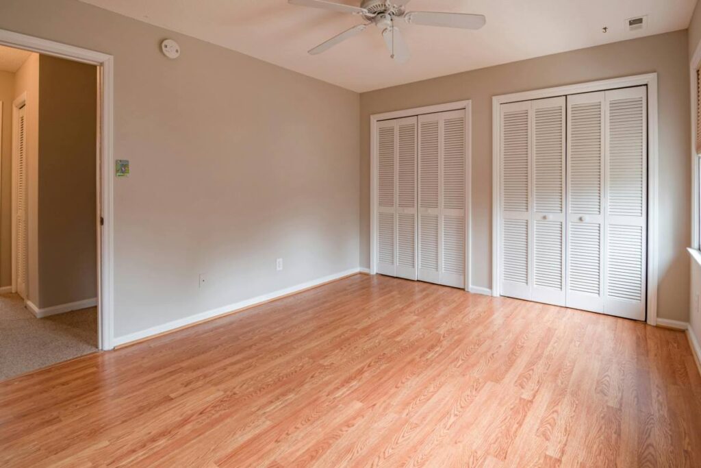 Polished hardwood floor in an empty modern room after refinishing service in Dubai. our Polished hardwood floor in an empty modern room after refinishing service in Dubai.