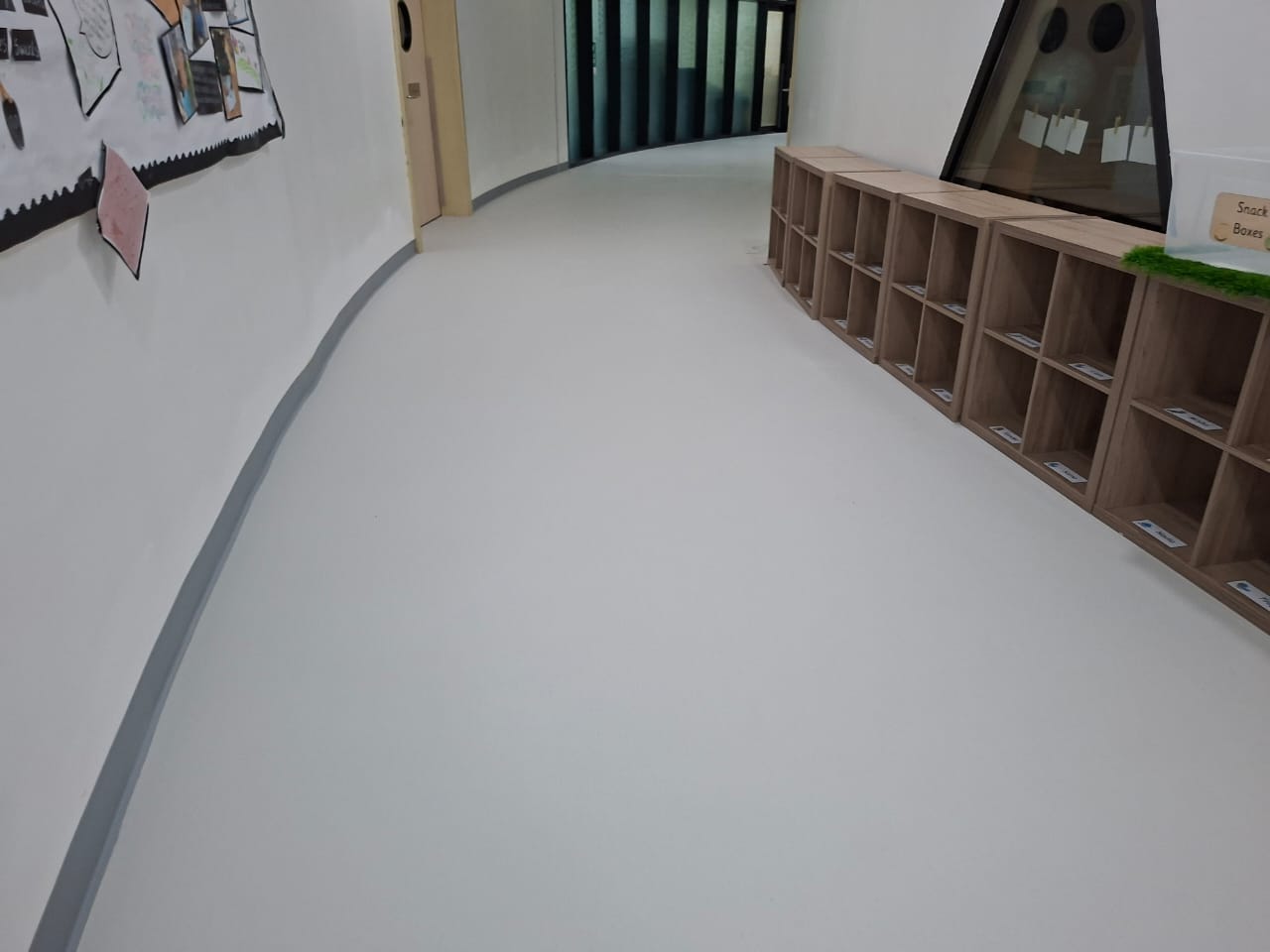 After vinyl floor deep cleaning and polishing in Dubai school corridor