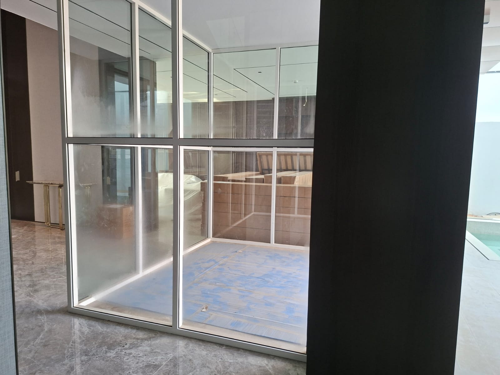 Exterior glass panel dusty before post construction cleaning