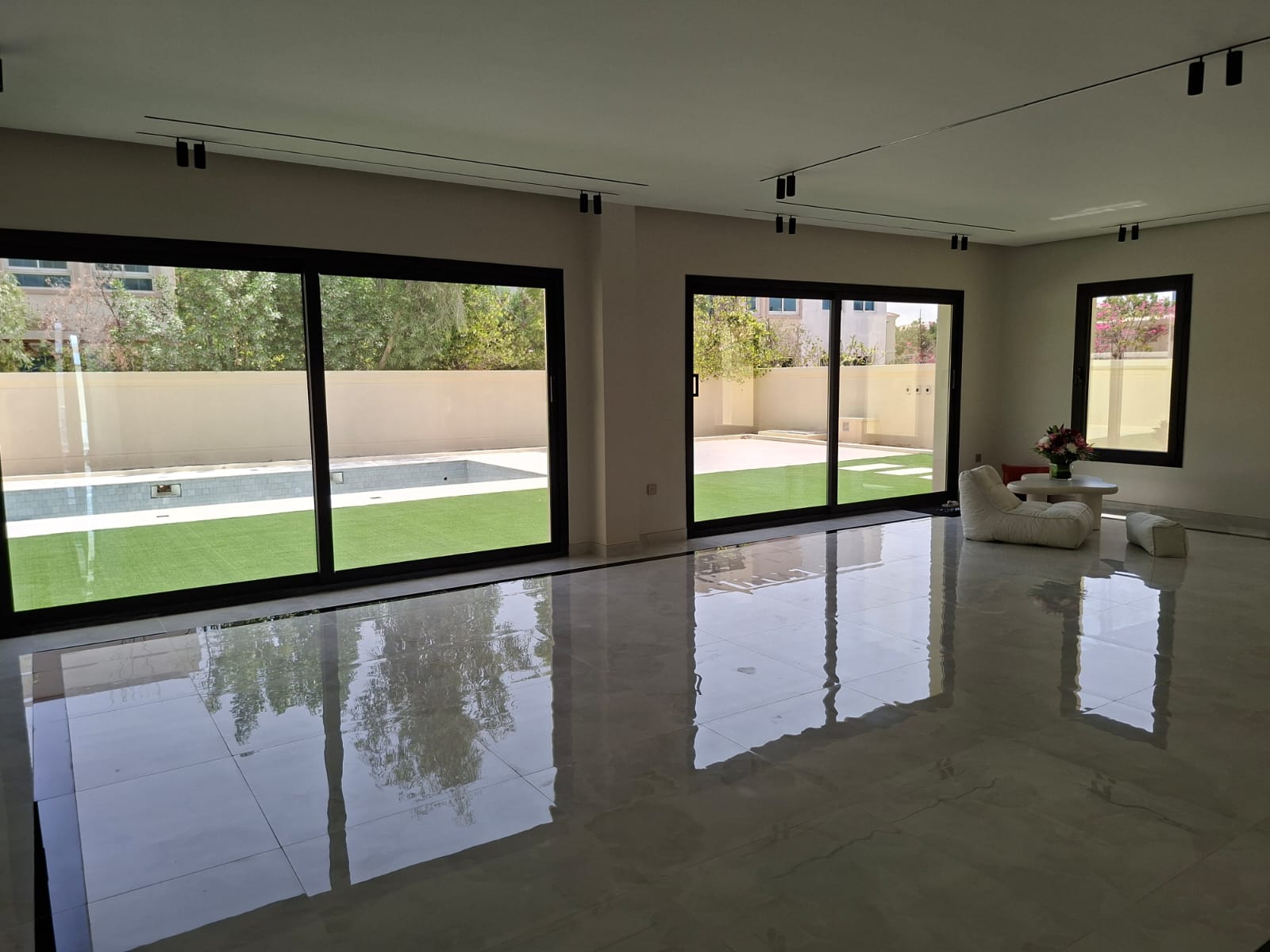 Living room tiles restored with machine scrubbing and polishing — JVT villa case study