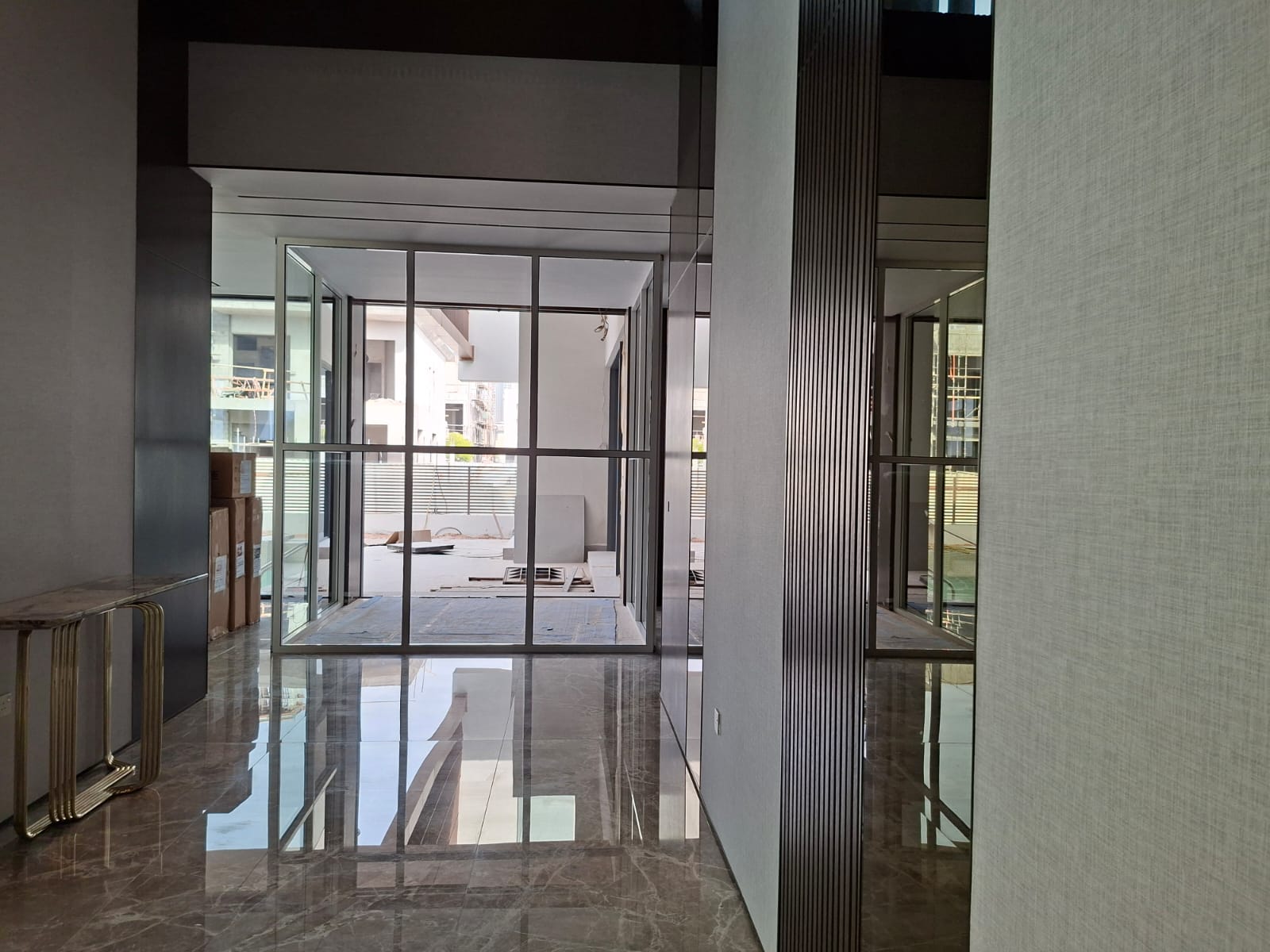 Polished marble lobby floor after post construction deep cleaning in Dubai