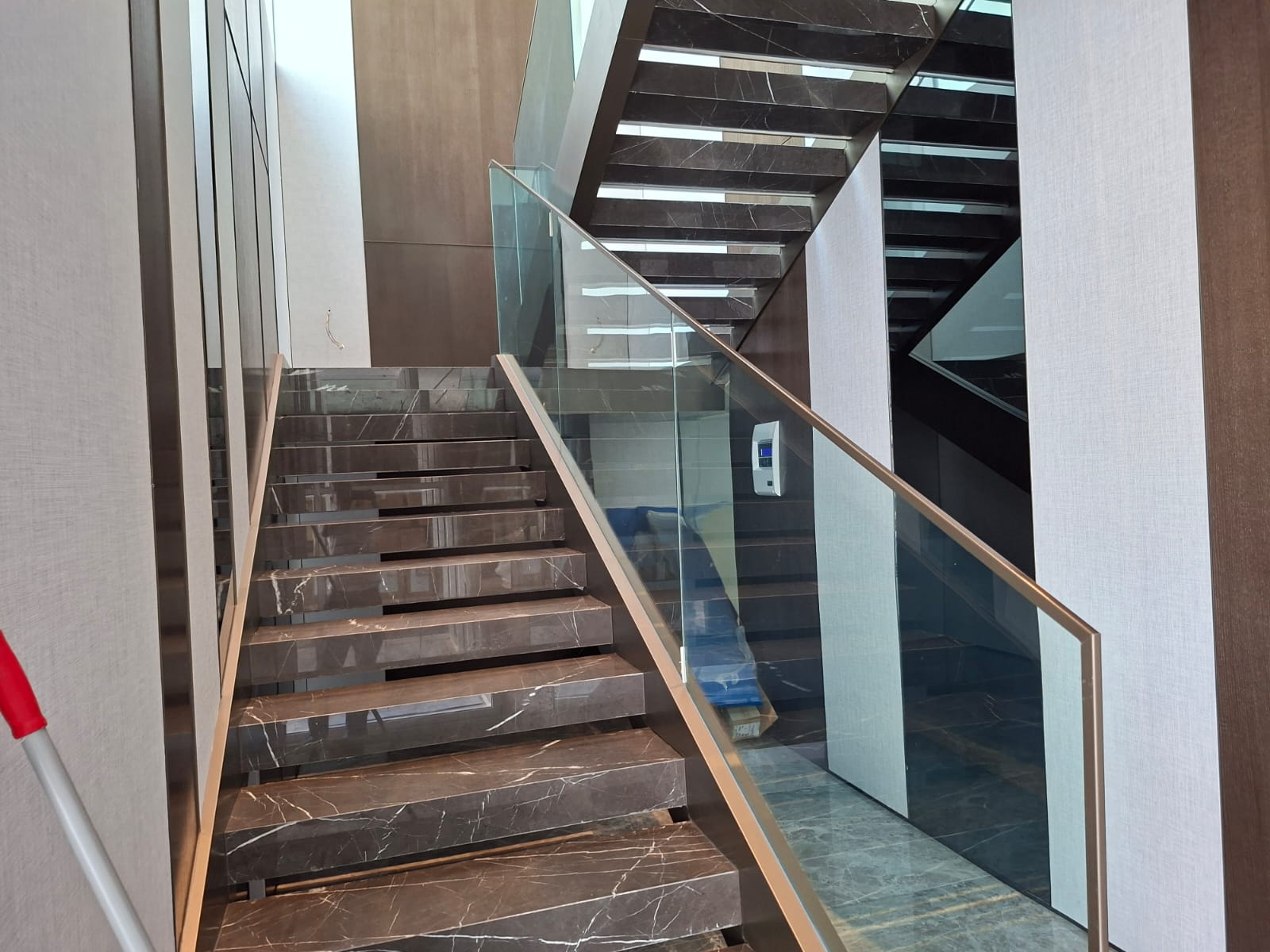 Meydan villa staircase glass after tape removal and polishing